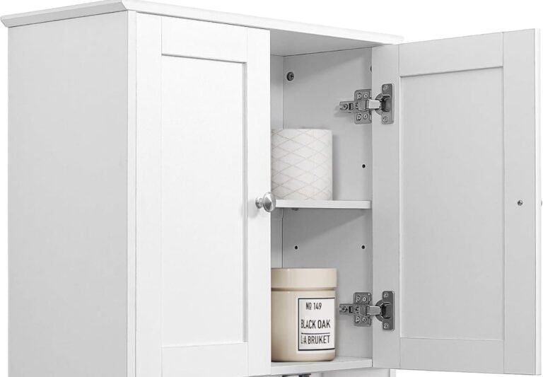 cabinet hinge installed on a white kitchen cabinet door