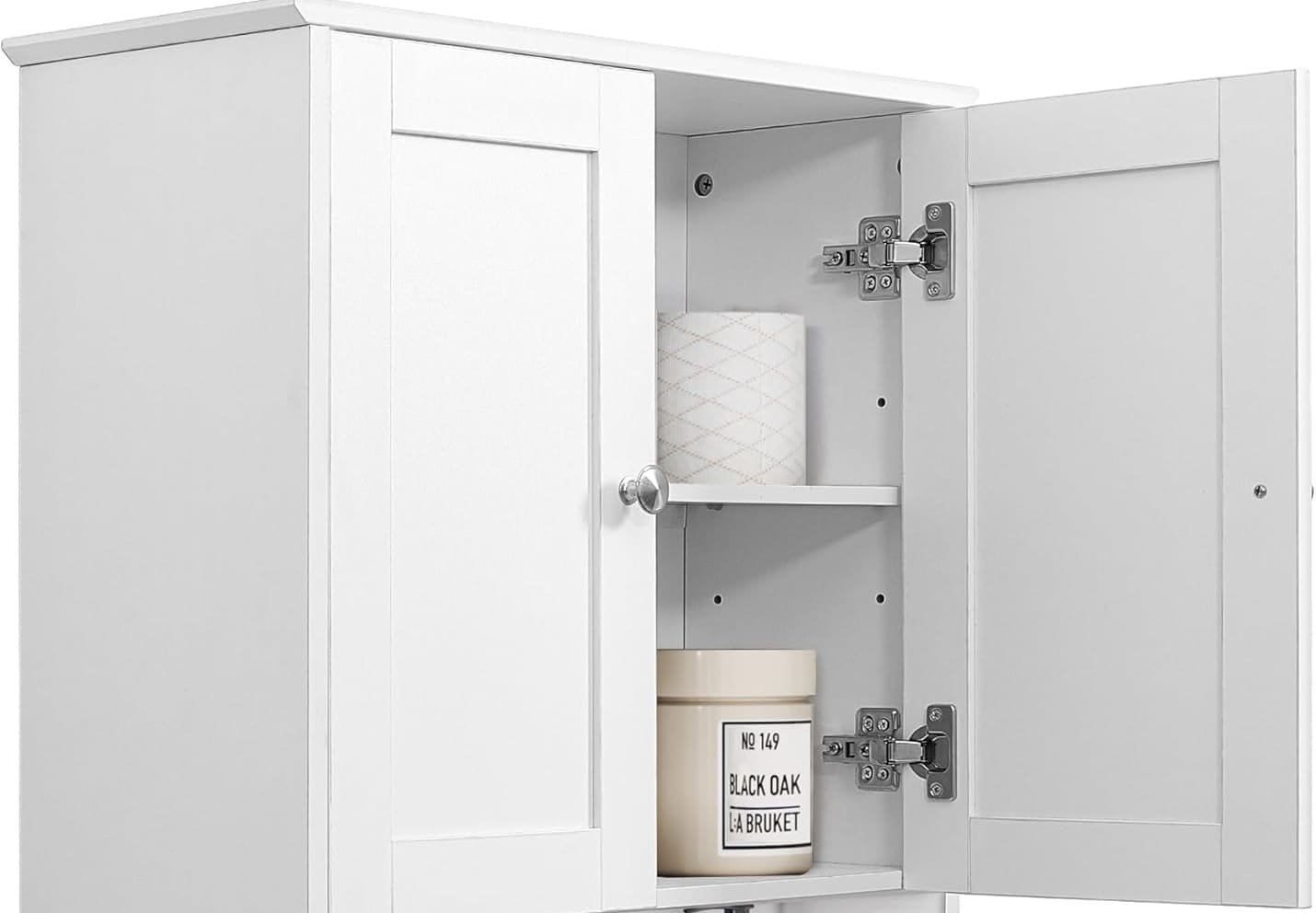 cabinet hinge installed on a white kitchen cabinet door